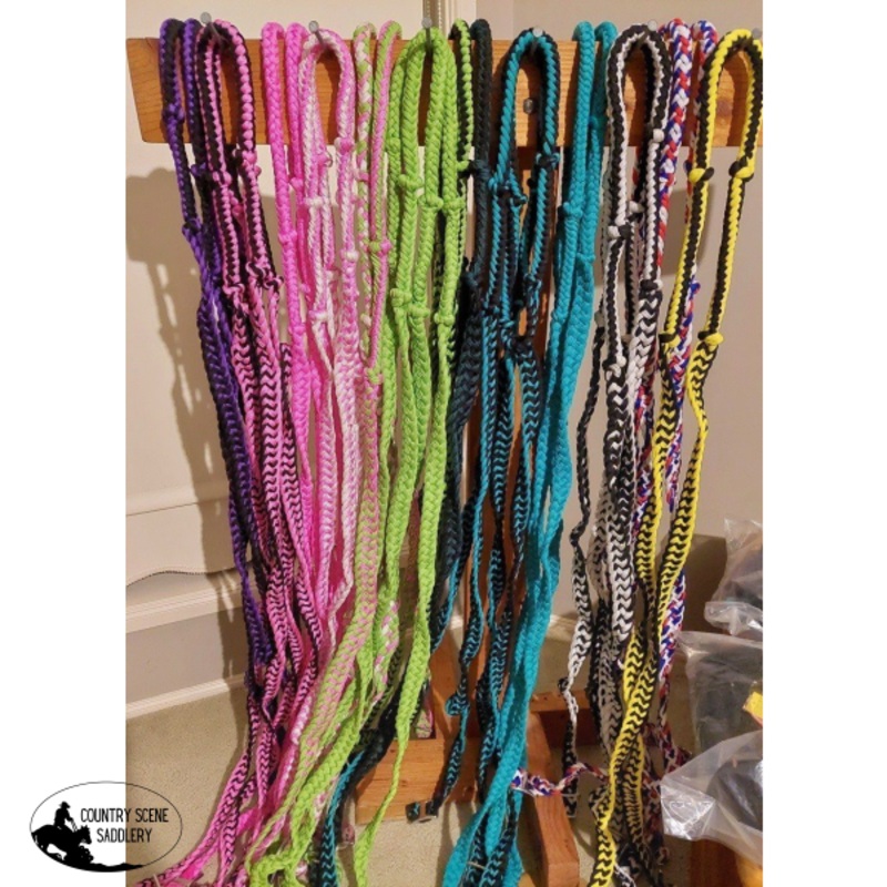Showmanbraided nylon barrel reins with easy grip knots.