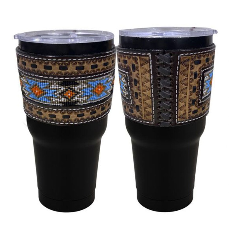 30 oz Insulated Black Tumbler with Removable Argentina Cow Leather Beaded Sleeve – blue and white accents